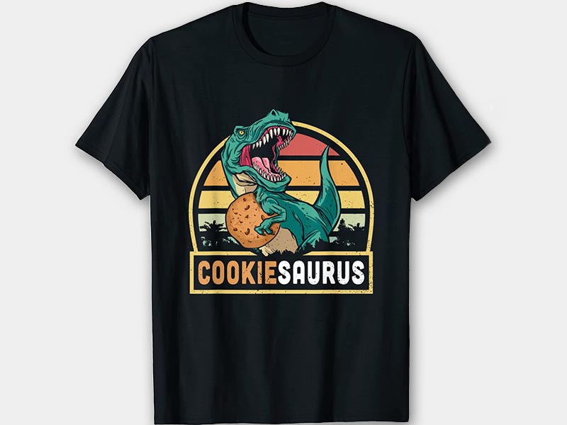 schwarzes T-Shirt mit T-Rex und einem Keks vor Retro Sonnenuntergang mit der Unterschrift Cookiesaurus
